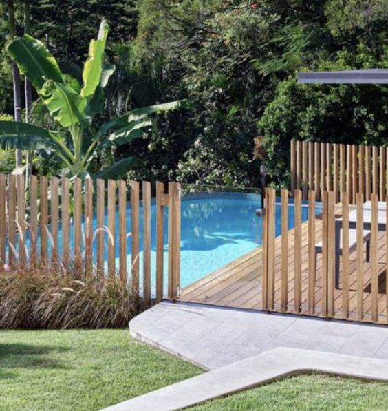Above Ground Pool Fencing With Wood & Grass