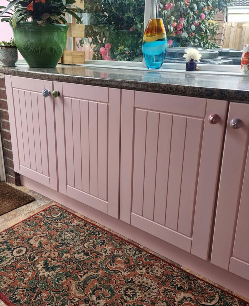 Pastel Pink Cabinets with Chrome Handles